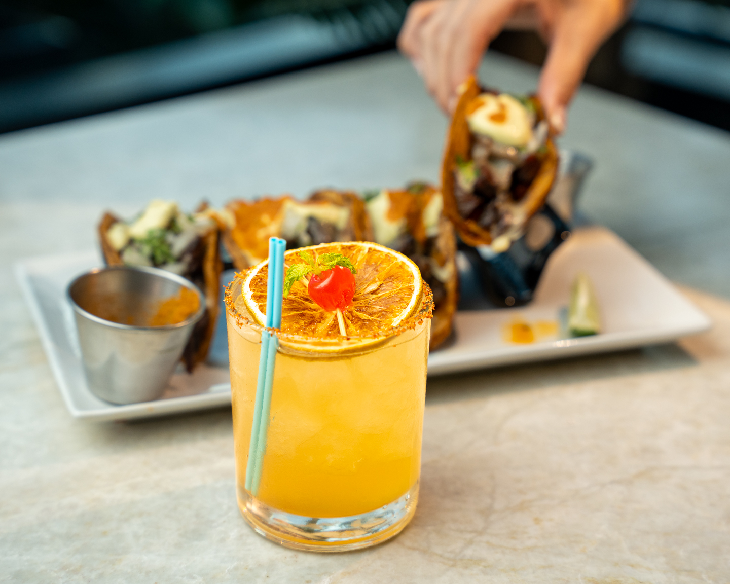 Bright citrus cocktail from Aioli’s drinks collection